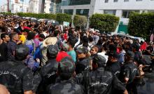 Tunisians demonstrating in support of the protesters of El Kamour oilfield, near the town of Tatouine, clash with riot police officers on Habib Bourguiba Avenue in Tunis, Tunisia, May 22, 2017. PHOTO BY REUTERS/Zoubeir Souissi