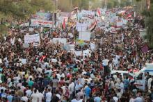 People shout slogans during a demonstration against corruption and poor services in regard to power cuts and water shortages, in Basra province, Iraq, August 14, 2015. PHOTO BY REUTERS/Essam Al-Sudani