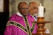 Former Archbishop of Cape Town and veteran anti-apartheid campaigner Desmond Tutu holds a mass at Cape Town's Anglican St George's Cathedral, December 6, 2013. PHOTO BY REUTERS/Sumaya Hisham