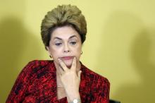 Brazil's President Dilma Rousseff reacts as she attends a signing ceremony for new universities, at Planalto Palace in Brasilia, Brazil, May 9, 2016. PHOTO BY REUTERS/Adriano Machado