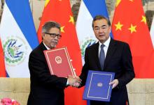 Chinese Foreign Minister Wang Yi (R) and El Salvador's Foreign Minister Carlos Castaneda attend a signing ceremony to establish diplomatic ties between the two countries, at the Diaoyutai State Guesthouse in Beijing, China, August 21, 2018. PHOTO BY REUTERS/Jason Lee