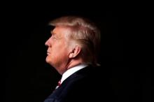 Republican U.S. presidential candidate Donald Trump poses for a photo after an interview with Reuters in his office in Trump Tower, in the Manhattan borough of New York City, U.S., May 17, 2016. PHOTO BY REUTERS/Lucas Jackson
