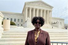 Doreen Oport, who was injured in the attack on the U.S. embassy in Nairobi, Kenya in 1998, stands outside the U.S. Supreme Court after oral arguments in Washington, U.S. February 24, 2020. PHOTO BY REUTERS/Andrew Chung