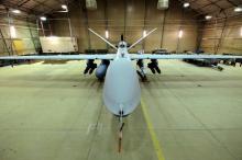 A U.S. Air Force MQ-9 Reaper drone sits armed with Hellfire missiles and a 500-pound bomb in a hanger at Kandahar Airfield, Afghanistan, March 9, 2016. PHOTO BY REUTERS/Josh Smith