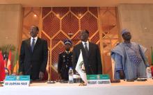 Burkina Faso's President Blaise Compaore (L), Ivory Coast's President Alassane Ouattara (C) and Economic Community of West African States (ECOWAS) Commission's President Kadre Desire Ouedraogo attend the 44th ECOWAS Summit at Felix Houphouet Boigny Foundation in Yamoussoukro
