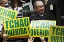 President of the Chamber of Deputies Eduardo Cunha observes congressmen, who support the impeachment, demonstrate during a session to review the request for Brazilian President Dilma Rousseff's impeachment, at the Chamber of Deputies in Brasilia, Brazil, April 16, 2016. PHOTO BY REUTERS/Ueslei Marcelino