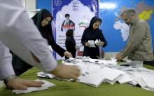 Election officials count ballot papers after the close of polling stations during elections for the parliament and a leadership body called the Assembly of Experts, which has the power to appoint and dismiss the supreme leader, in Tehran, February 26, 2016. PHOTO BY REUTERS/Raheb Homavandi