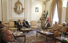 Iran's Deputy Foreign Minister, Mehdi Danesh Yazdi (centre L) sits with Iran's charge d'affaires to the Iranian Embassy in London, Mohammad Hassan Habibollahzadeh, during a ceremony at his residency to reopen Iran's Embassy in London, Britain, August 23, 2015. PHOTO BY REUTERS/Peter Nicholls