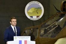  French President Emmanuel Macron addresses French troops in Africa's Sahel region in Gao, northern Mali, 19 May 2017. PHOTO BY REUTERS/Christophe Petit Tesson