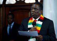 Zimbabwean President Emmerson Mnangagwa addresses mourners gathered at former President Robert Mugabe's 'Blue Roof' residence in Harare, Zimbabwe, September 12, 2019. PHOTO BY REUTERS/Philimon Bulawayo