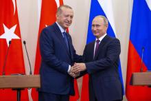 Russian President Vladimir Putin (R) and his Turkish counterpart Tayyip Erdogan shake hands during a news conference following their talks in Sochi, Russia, September 17, 2018. PHOTO BY REUTERS/Alexander Zemlianichenko