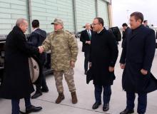 Turkish President Tayyip Erdogan is welcomed by Chief of the General Staff Hulusi Akar, Deputy Prime Minister Bekir Bozdag and Defence Minister Nurettin Canikli upon his arrival at the border city of Hatay, Turkey, January 25, 2018. PHOTO BY REUTERS/Murat Cetinmuhurdar/Presidential Palace