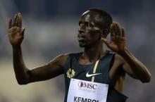 Ezekiel Kemboi of Kenya celebrates his victory in the men's 3000m Steeplechase during the IAAF Diamond League athletics meet in Doha, May 9, 2014. PHOTO BY REUTERS/Fadi Al-Assaad