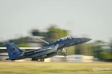 A U.S. Air Force F-15E Strike Eagle from the 48th Fighter Wing lands at Incirlik Air Base, Turkey, November 12, 2015. PHOTO BY REUTERS/USAF
