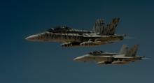 Two U.S. Marine Corps F-18 Super Hornets depart after receiving fuel from a 908th Expeditionary Air Refueling Squadron KC-10 Extender during a flight in support of Operation Inherent Resolve, May 31, 2017. PHOTO BY REUTERS/U.S. Air Force/Staff Sgt. Michael Battles