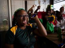 South African fans celebrate winning the world cup final. PHOTO BY REUTERS/Rogan Ward