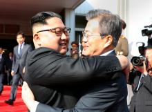 South Korean President Moon Jae-in bids farewell to North Korean leader Kim Jong Un as he leaves after their summit at the truce village of Panmunjom, North Korea, in this handout picture provided by the Presidential Blue House on May 26, 2018. PHOTO BY REUTERS/The Presidential Blue House 