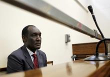 Exiled Rwandan General Faustin Kayumba Nyamwasa looks on during his court appearance in Johannesburg