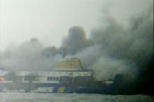 The car ferry Norman Atlantic burns in waters off Greece in this still image from video, December 28, 2014. PHOTO BY REUTERS/Skai TV via Reuters TV