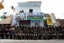 Kurdish female fighters of the Women's Protection Unit (YPJ) hold their weapons as they sit in the Sheikh Maksoud neighbourhood of Aleppo, Syria, February 7, 2018. PHOTO BY REUTERS/Omar Sanadiki