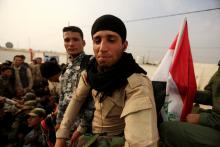 Fighters who were displaced by Islamic State gather at Debaga camp on the outskirts of Erbil, Iraq, before heading to the front line for the Mosul offensive against the group, October 24, 2016. PHOTO BY REUTERS/Zohra Bensemra