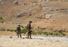 Hezbollah fighters are seen in Jroud Arsal, near Syria-Lebanon border, August 12, 2017. PHOTO BY REUTERS/Ali Hashisho