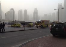 Fire engines are seen after a fire broke out at "The Torch", a residential high-rise tower, in Dubai, February 21, 2015. PHOTO BY REUTERS/David French