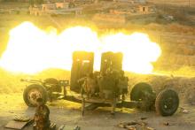 Peshmerga forces fire an anti-aircraft gun towards Islamic state militants positions in the town of Naweran near Mosul, Iraq, October 20, 2016. PHOTO BY REUTERS/Zohra Bensemra