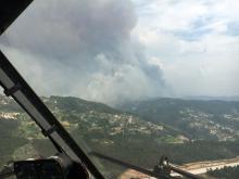 Aerial view of a forest fire is seen from the cabin of a Spanish fire fighting plane near Pedrogao Grande, Portugal, June 18, 2017. PHOTO BY REUTERS/Spanish Defence Ministry-Spanish Air Force