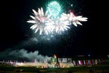 Fireworks explode as re-enactors perform during the opening show "Inferno" by artistic director Luc Petit, for the bicentennial celebrations for the Battle of Waterloo, in Waterloo, Belgium, June 18, 2015. PHOTO BY REUTERS/Stinger
