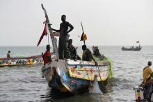 Fishermen land their boat at the beach near the coastal town of Joal-Fadiouth, Senegal, April 10, 2018. PHOTO BY REUTERS/Sylvain Cherkaoui 