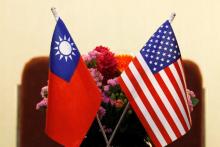 Flags of Taiwan and U.S. are placed for a meeting between U.S. House Foreign Affairs Committee Chairman Ed Royce speaks and with Su Chia-chyuan, President of the Legislative Yuan in Taipei, Taiwan, March 27, 2018. PHOTO BY REUTERS/Tyrone Siu