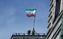 The national flag of Iran is seen on top of the Austrian Chancellery during the visit of President Hassan Rouhani in Vienna, Austria July 4, 2018. PHOTO BY REUTERS/Lisi Niesner