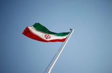 An Iranian national flag flutters in Tehran, April 15, 2011. PHOTO BY REUTERS/STR