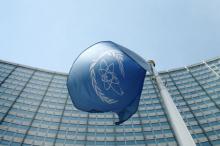 The flag of the International Atomic Energy Agency (IAEA) flies in front of its headquarters in Vienna, Austria, May 28, 2015. PHOTO BY REUTERS/Heinz-Peter Bader