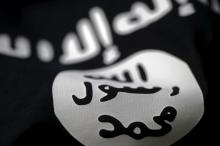 An Islamic State flag is seen in this picture illustration taken February 18, 2016. PHOTO BY REUTERS