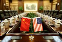 Flags of U.S. and China are placed for a meeting at the Ministry of Agriculture in Beijing, China, June 30, 2017. PHOTO BY REUTERS/Jason Lee