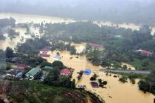 An aerial view of flooded streets of the National Park in Kuala Tahan, Pahang, December 24, 2014. PHOTO BY REUTERS/Nazirul Roselan