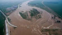 An aerial view shows that roads and fields are flooded in Xingtai, Hebei Province, China, July 21, 2016. PHOTO BY REUTERS/Stringer