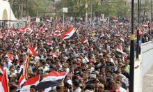 Followers of Iraq's powerful Shi'ite cleric Moqtada al-Sadr chant slogans during a protest demanding that parliament approves a long-delayed new cabinet and end political and sectarian wrangling that is hampering a vote on the matter at Tahrir Square in Baghdad, Iraq April 26, 2016. PHOTO BY REUTERS/Ahmed Saad