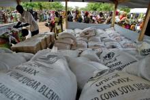 Stocks of food aid are piled at a distribution centre, where more than 1,000 women and children wait to receive emergency supplies at the village of Yama in northwestern Niger in a file photo. PHOTO BY REUTERS/Finbarr O'Reilly