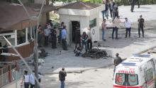 Police forensic experts inspect the scene after an explosion in front of the city's police headquarters in Gaziantep, Turkey, May 1, 2016. PHOTO BY REUTERS/Ihlas News Agency