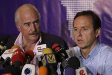 Bolivia's former president Jorge Quiroga (R) speaks next to Colombia's former president Andres Pastrana during a news conference in Caracas, May 28, 2015. PHOTO BY REUTERS/Marco Bello