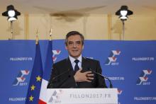 Francois Fillon, former French prime minister and member of Les Republicains political party, delivers his speech after partial results in the second round for the French center-right presidential primary election in Paris, France, November 27, 2016. REUTERS/Christian Hartmann