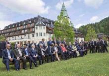 German Chancellor Angela Merkel and other G7 summit participants gather outside the Elmau castle in Kruen near Garmisch-Partenkirchen, Germany, June 8, 2015. PHOTO BY REUTERS/Michael Kappeler
