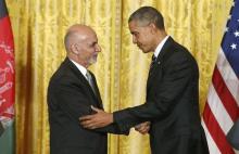 U.S. President Barack Obama shakes hands with Afghanistan's President Ashraf Ghani (L) after their joint news conference at the White House in Washington, March 24, 2015. PHOTO BY REUTERS/Jonathan Ernst
