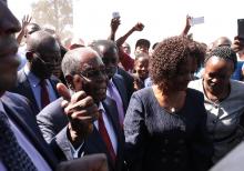 Former Zimbabwean president Robert Mugabe, accompanied by his wife Grace, arrives to vote in the general elections in Harare, Zimbabwe, July 30, 2018. PHOTO BY REUTERS/Mike Hutchings