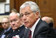 U.S. Secretary of Defense Chuck Hagel (R) and Chairman of the Joint Chiefs of Staff U.S. Army General Martin Dempsey (L) testify before the House Armed Services Committee hearing on "The FY2015 National Defense Authorization Budget Request from the Department of Defense" on Capitol Hill in Washington