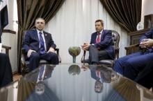Syria's Minister of National Reconciliation Affairs Ali Haidar (L) sits with Peter Maurer, President of the International Committee of the Red Cross (ICRC), in Damascus, Syria February 23, 2016. PHOTO BY REUTERS/Omar Sanadiki
