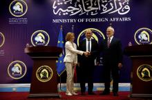 French Defence Minister Florence Parly (L) shakes hands with Iraqi Foreign Minister Ibrahim al-Jaafari with French Foreign Minister Jean-Yves Le Drian present during a joint news conferencein Baghdad, Iraq, August 26, 2017. PHOTO BY REUTERS/Khalid al Mousily